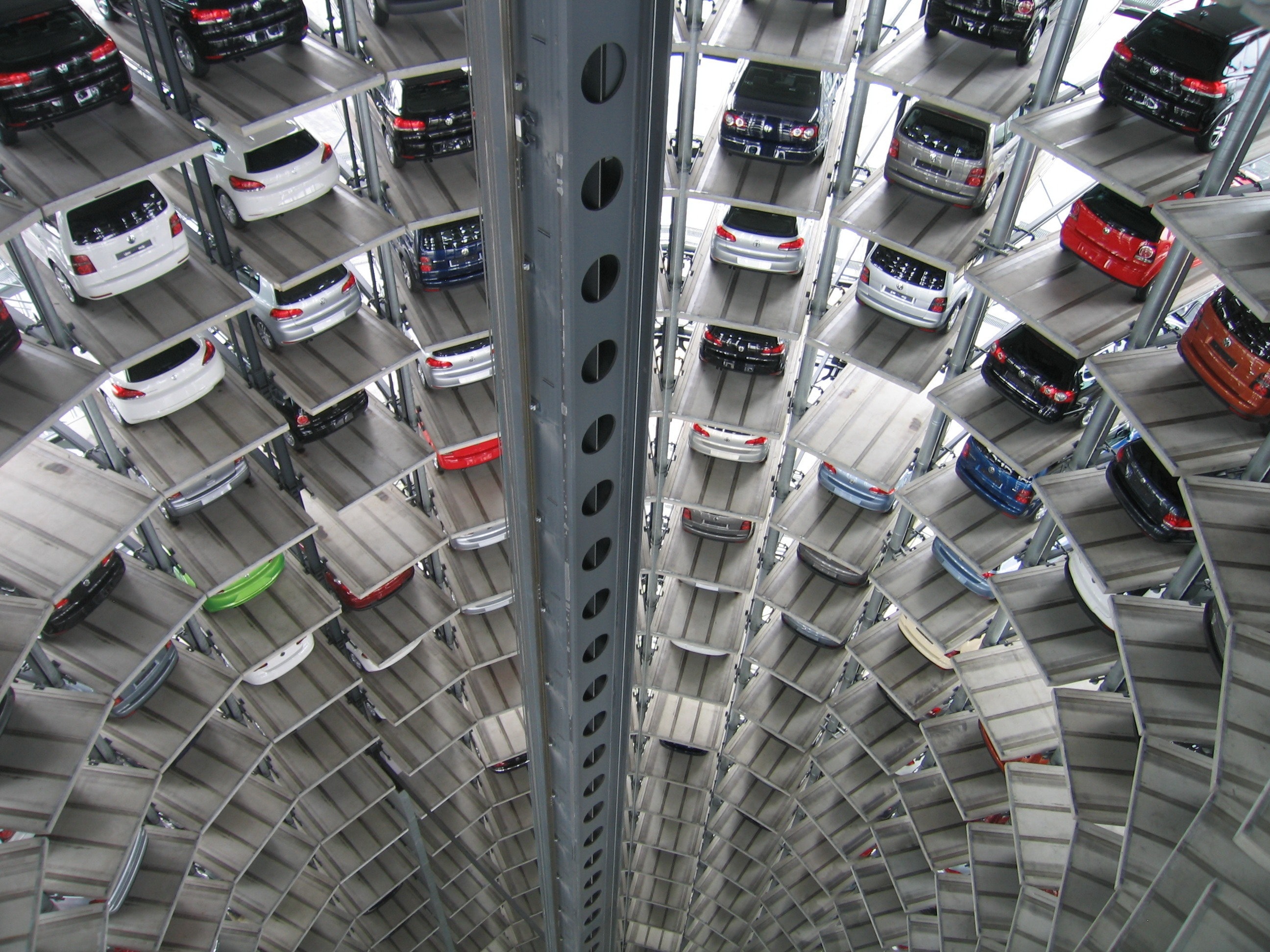 Cars parked in a curved parking lot