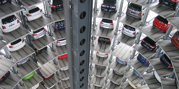 Cars parked in a curved parking lot