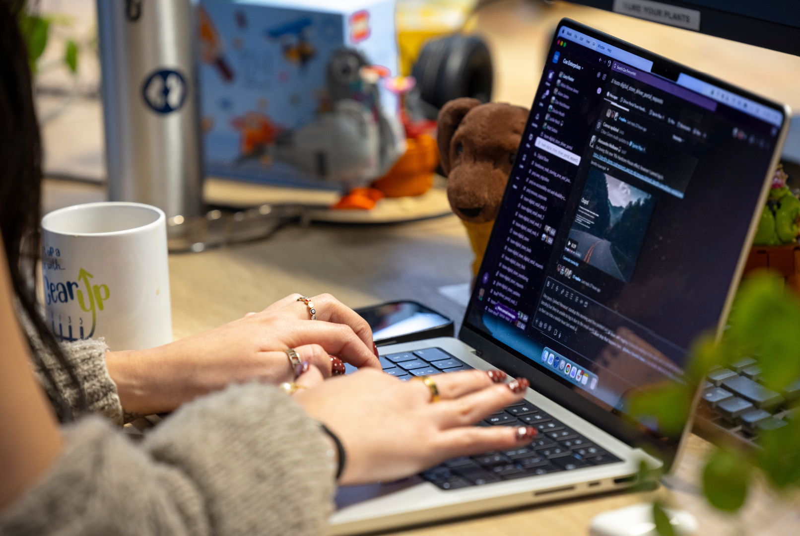 woman typing on a computer