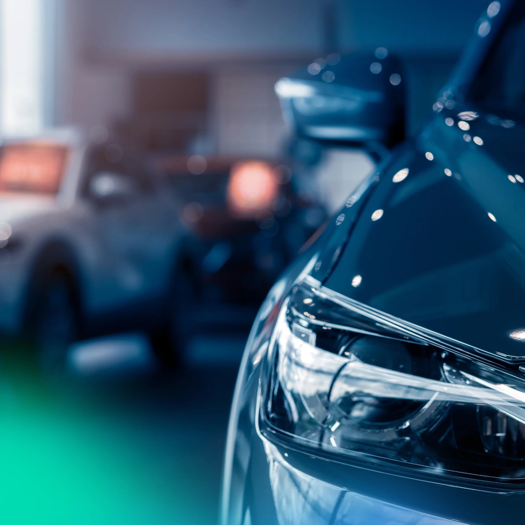 Close up of a car headlight in a showroom